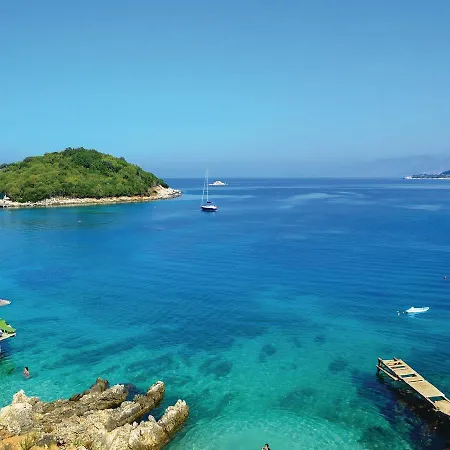 Ksamil Xi *